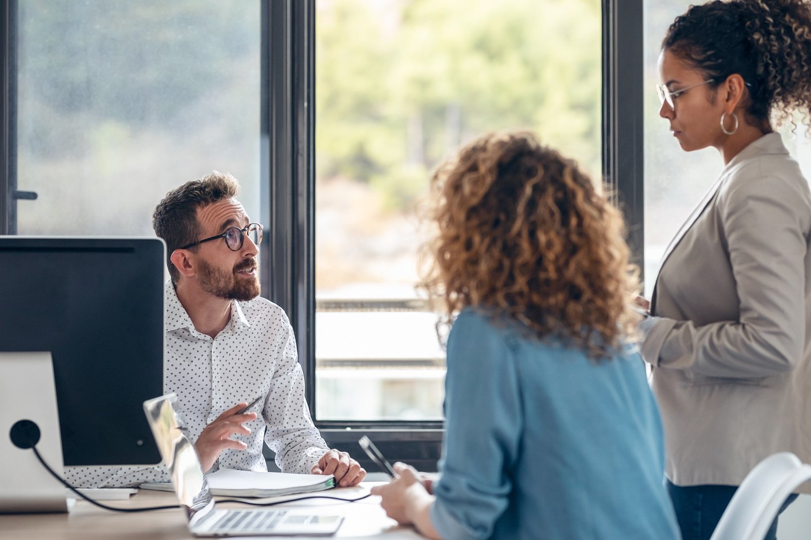 Team meeting in a bright office environment
